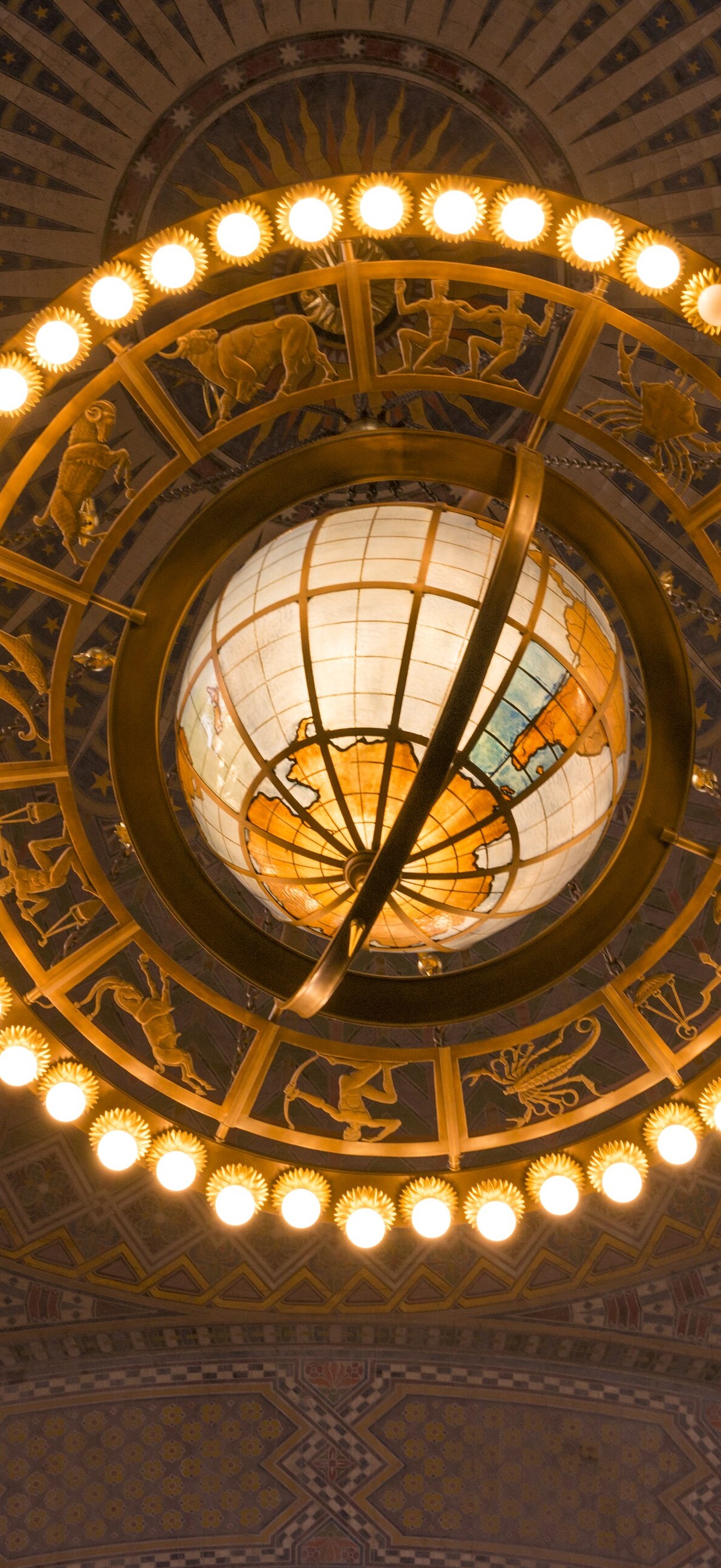 The 2,000-pound cast bronze chandelier beneath the mosaic dome in the downtown Central Lib