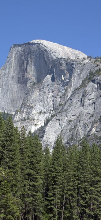 View of Half Dome formation in Yosemite National Park which spans eastern portions of Tuol