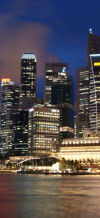 Singapore Skyline at Night with Blue Sky