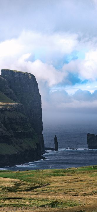 Lonely house on the coast near Eiði - Faroe Islands
