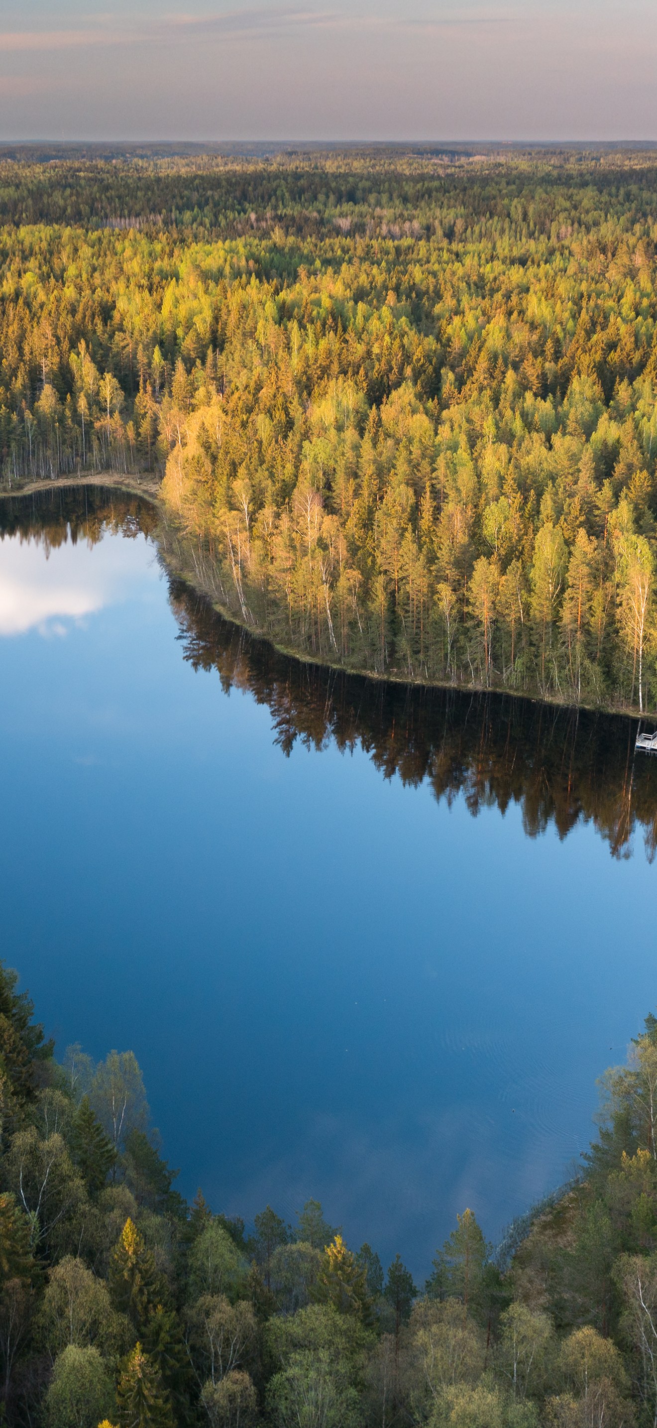 Bisajärvi in evening light from the southwest in Sipoonkorpi, Vantaa, Finland