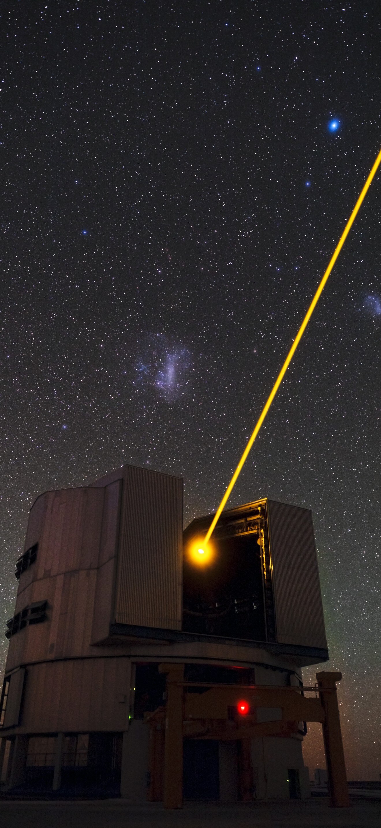 Yepun’s laser and the Magellanic Clouds