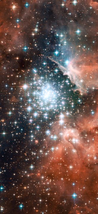 Extreme star cluster bursts into life in new Hubble image