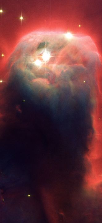Hubble's newest camera images ghostly star-forming pillar of gas and dust