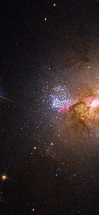 Hubble Finds a Black Hole Igniting Star Formation in a Dwarf Galaxy
