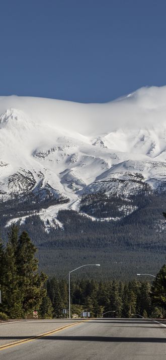 Distant views of looming Mount Shasta, located at the southern end of the Cascade Range in