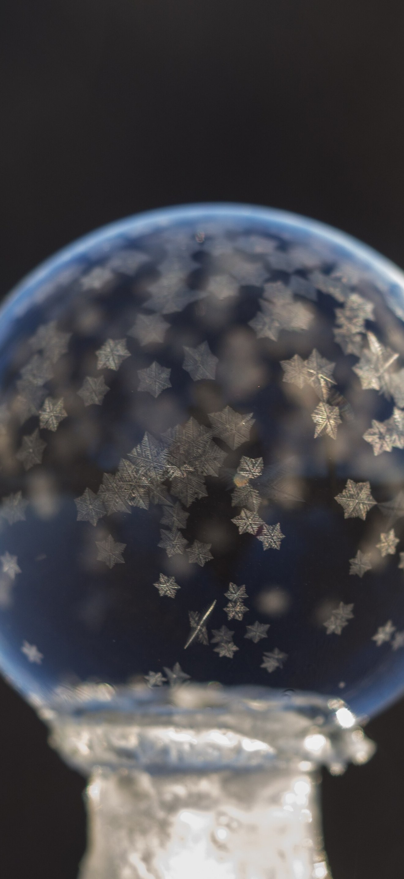Tiny frozen bubble snowflakes