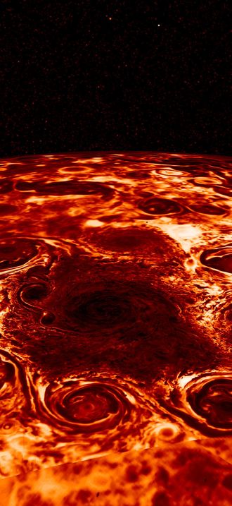Cyclone storms encircle Jupiter's North Pole, captured in infrared light by NASA's Juno sp