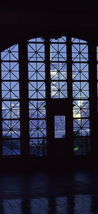 View of World Trade Center towers and the lower Manhattan skyline through registry room wi