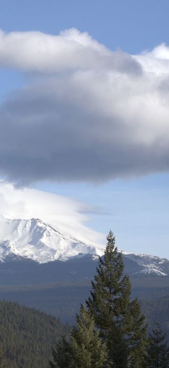 Distant views of looming Mount Shasta, located at the southern end of the Cascade Range in