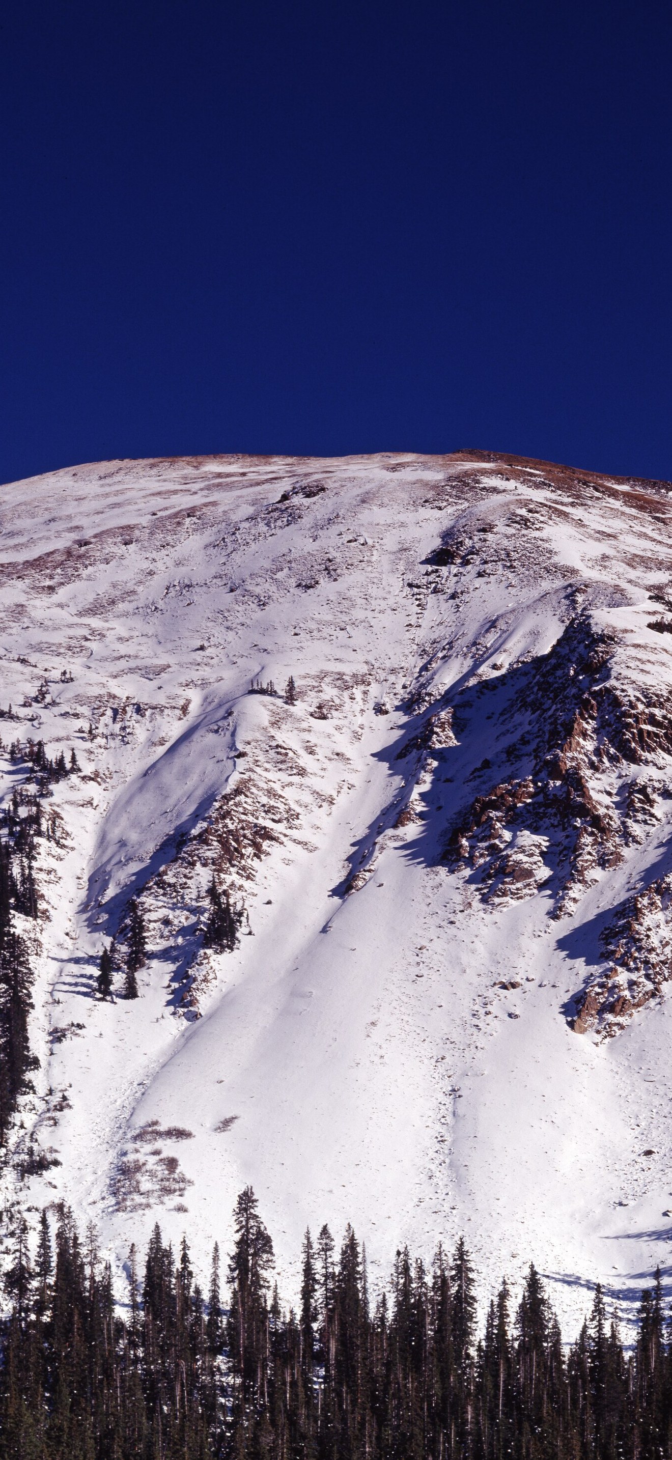 Snowy Rocky Mountain peak above Dillon, Colorado