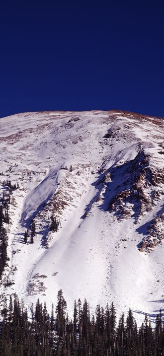 Snowy Rocky Mountain peak above Dillon, Colorado